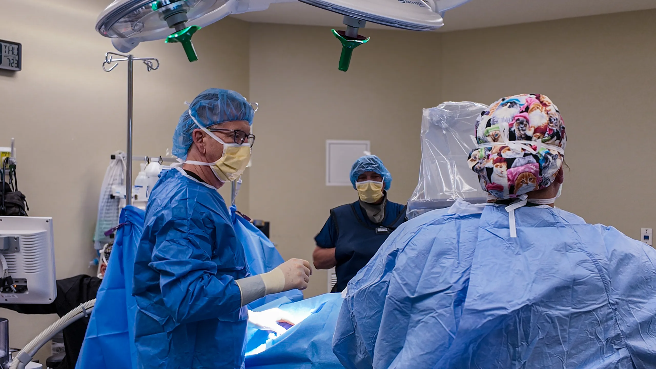 Surgical instruments on a green drape